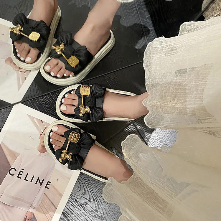 新款蝴蝶结小熊溶解底女鞋仙女风甜美踏屎感一字拖沙滩凉拖鞋百搭