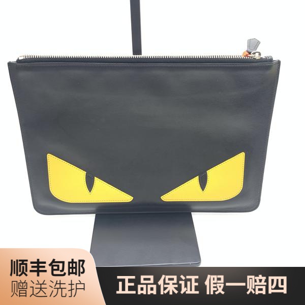 95新 FENDI/芬迪 芬迪黑色黄眼睛手拿包/10014821经典休闲男士   