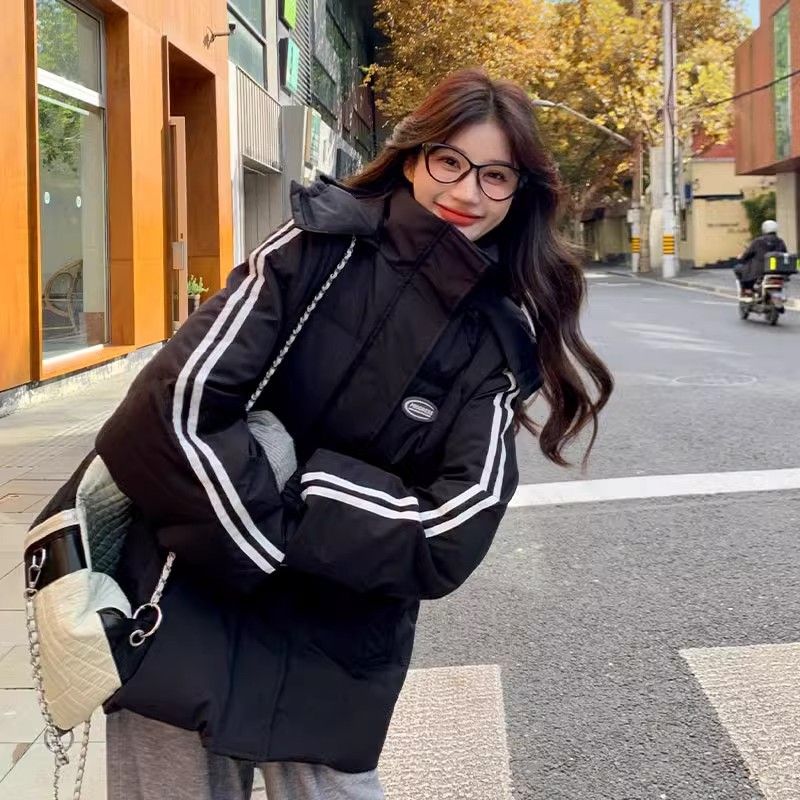 雪中飞黑色羽绒服女冬季2023新款韩系宽松学院风情侣百搭连帽加厚