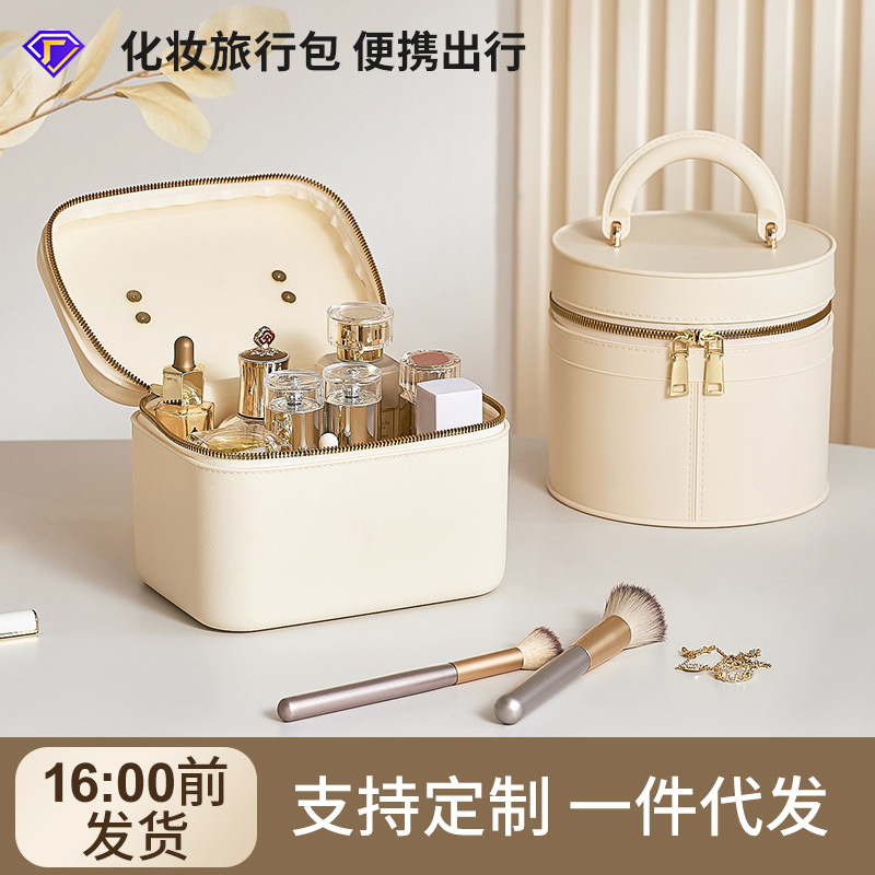 手提便携化妆包女高颜值大容量旅行带盖防水皮纹收纳包洗漱包批发