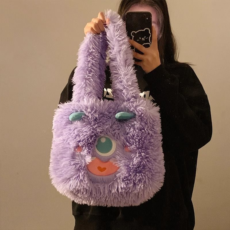 小怪兽包包百搭单肩包学生收纳可爱大手提包女化妆包舒适毛绒品质